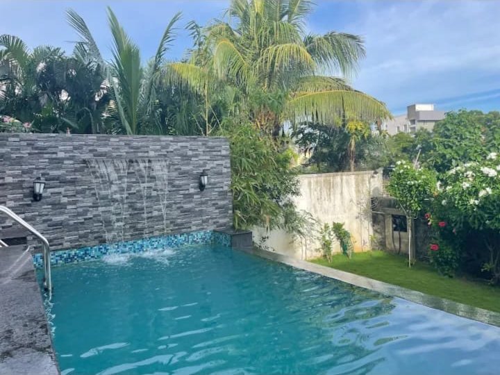 Pool and garden lawn
